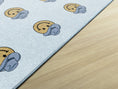 Load image into Gallery viewer, Smiley Cowboy Sit Spots on Light Blue Classroom Rug by Schoolgirl Style