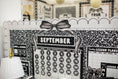Load image into Gallery viewer, Black and White Bulletin Board Calendar | Books and Bows