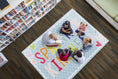 Load image into Gallery viewer, "Sprinkle Kindness" Checkerboard Classroom Rug by Schoolgirl Style
