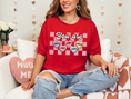 Load image into Gallery viewer, You are brave, sweet, and smart candy heart on checkerboard Valentine's Day t-shirt (on red and white)