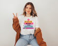 Load image into Gallery viewer, Bookworm with stack of books t-shirt | 5 colors | March is reading month