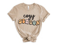Load image into Gallery viewer, Cozy Season Teacher T-Shirt | Available in white, pink, green and tan