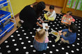 Load image into Gallery viewer, Small White Polka Dots on Black | Classroom Rug | Schoolgirl Style
