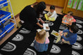 Load image into Gallery viewer, Black Boho Rainbow Sit Spots Classroom Rug by Schoolgirl Style