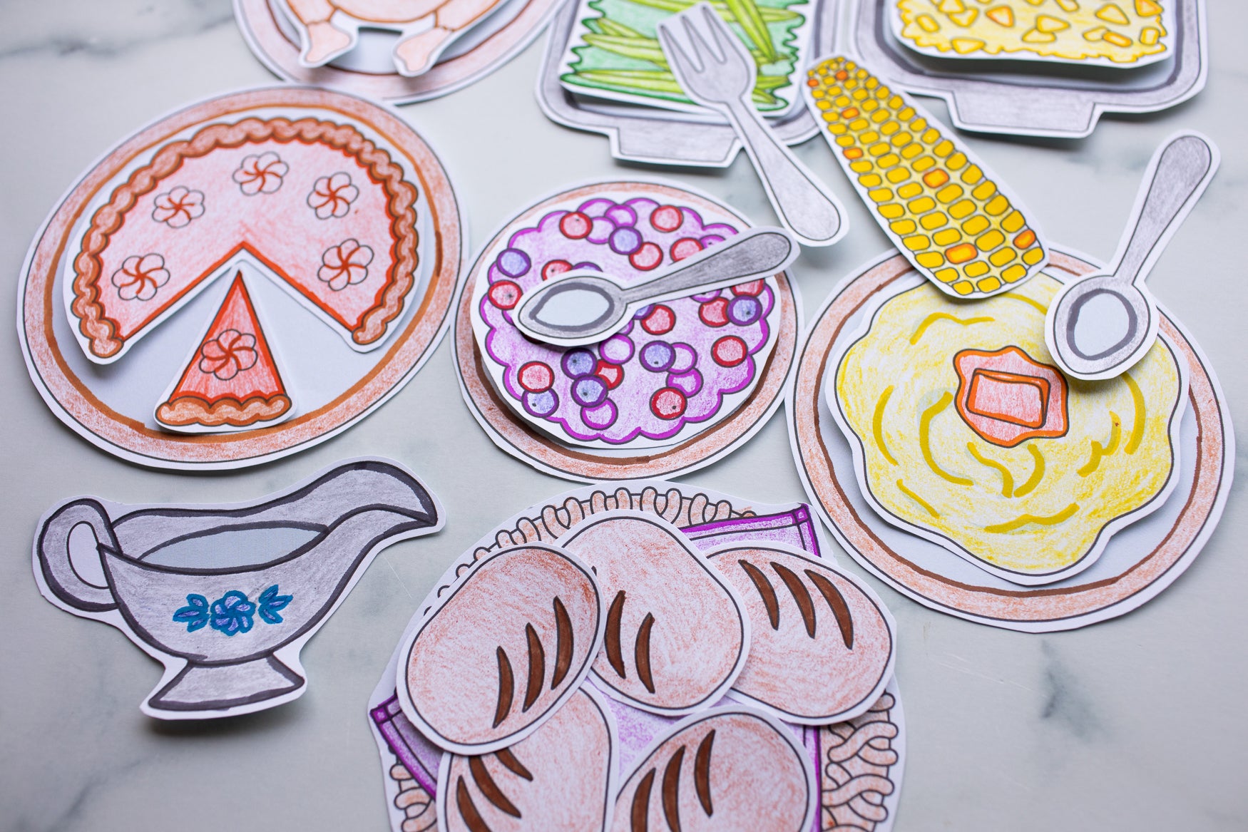 Colorful illustrations of food items on a gray background