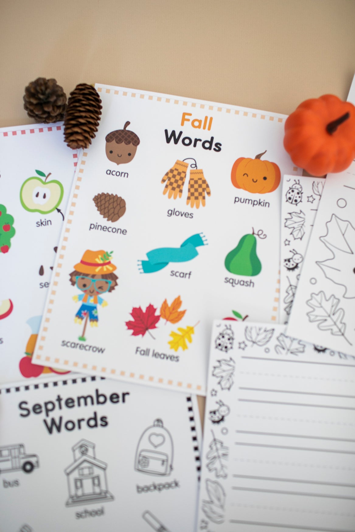 Fall words posters with acorns, a pumpkin on a beige background.