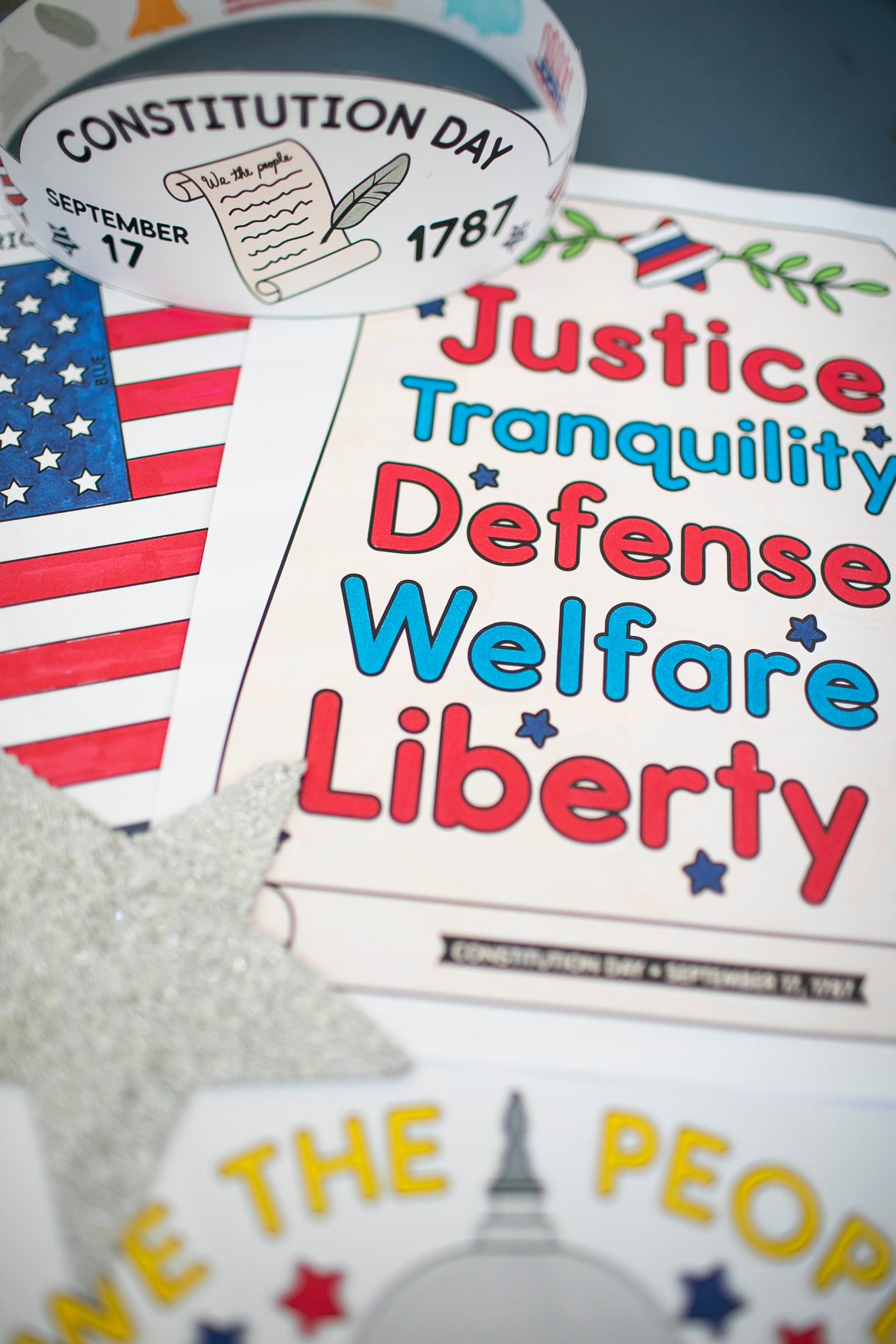 Educational materials celebrating Constitution Day with text and an American flag.