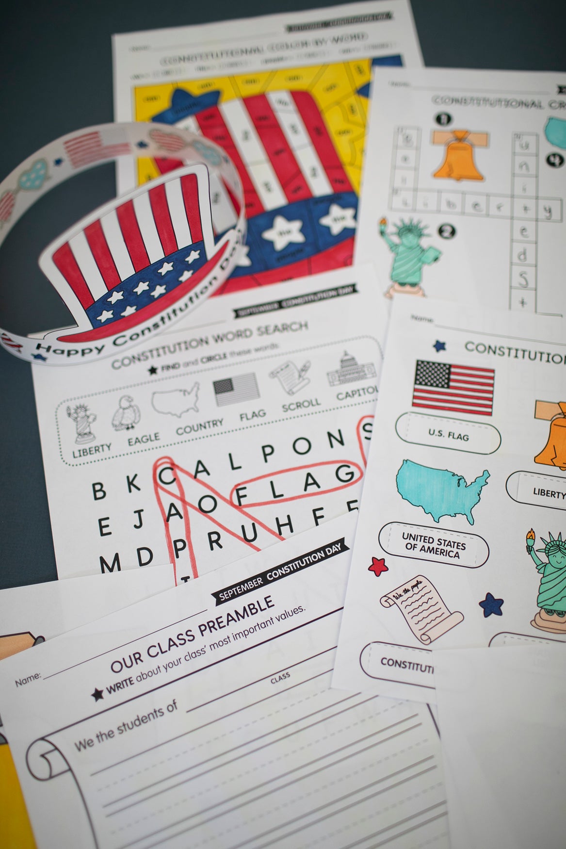 Educational materials about the Constitution with a focus on American flag and patriotic elements.
