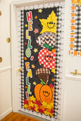 Load image into Gallery viewer, hello fall in primary colors walgreens classroom banner with a pumpkin, acorn, acorn, pumpkin, football and leaf on it with gingham details on a black background. 
