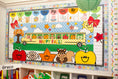 Load image into Gallery viewer, horizontal happy fall classroom banner that you get printed at Walgreens and the bus has happy fall icons peeking out of the window such as a leaf, scarecrow, acorn, and gingham apples.  
