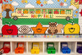 Load image into Gallery viewer, fall giant cutout toppers for the classroom.  Apples, football, leaf, and a squirrel.  
