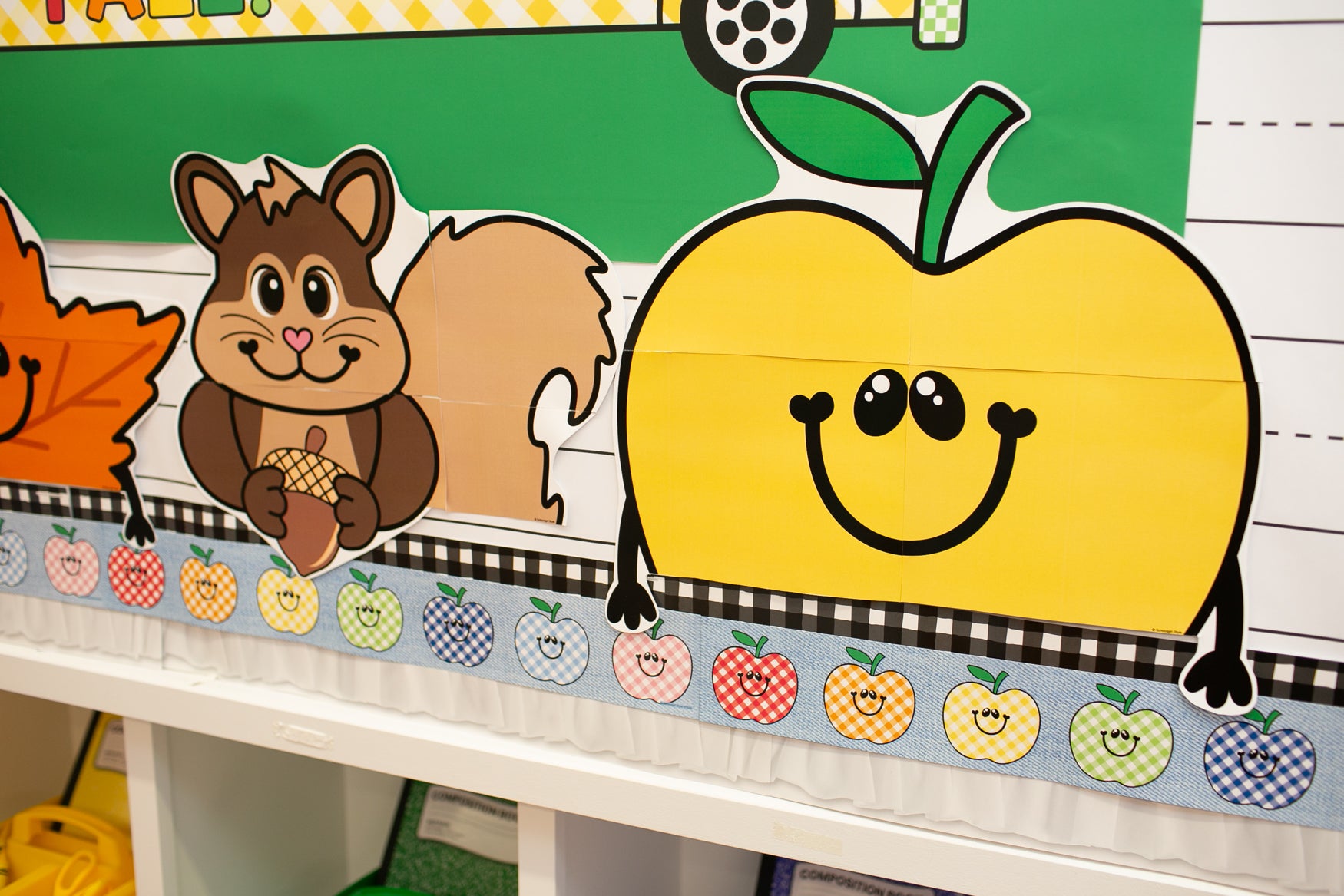 fall giant cutout toppers for the classroom.  Apples, football, leaf, and a squirrel.  