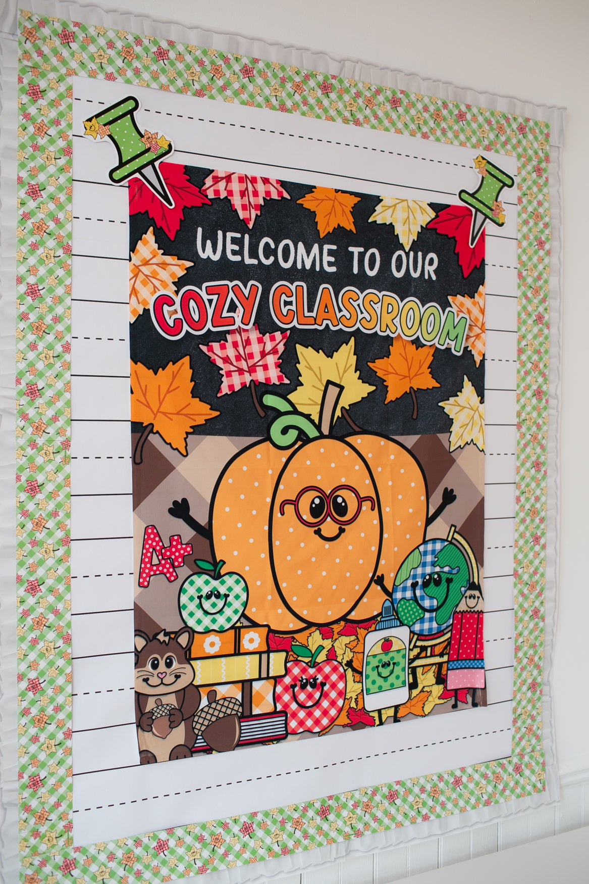 welcome to our cozy classroom tapestry with a pumpkin with glasses and leaves and fall inspired school supplies. 