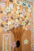 Load image into Gallery viewer, classroom tree decor with pastel leaves and acorns
