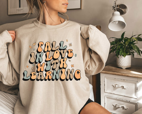 "Fall in Love with Learning" Teacher Crewneck Sweatshirt by UPRINT
