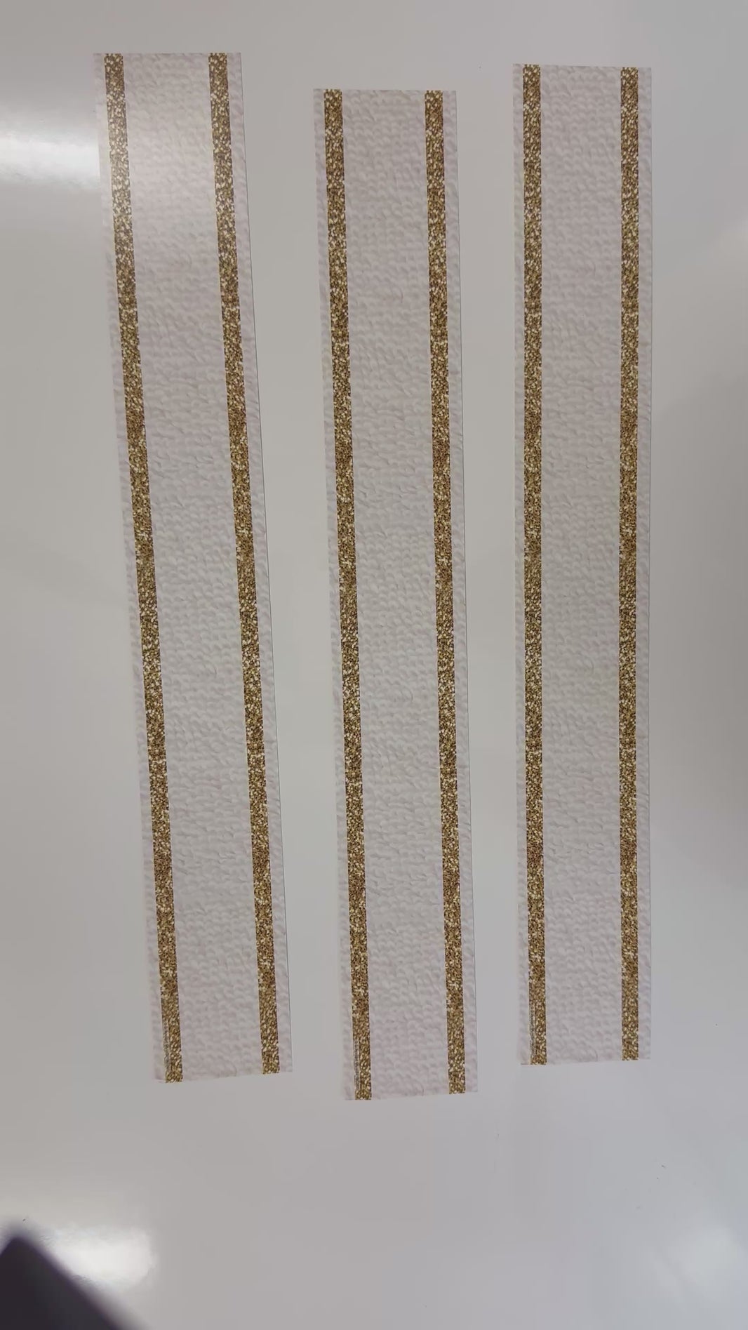 White carpet with gold glitter border 