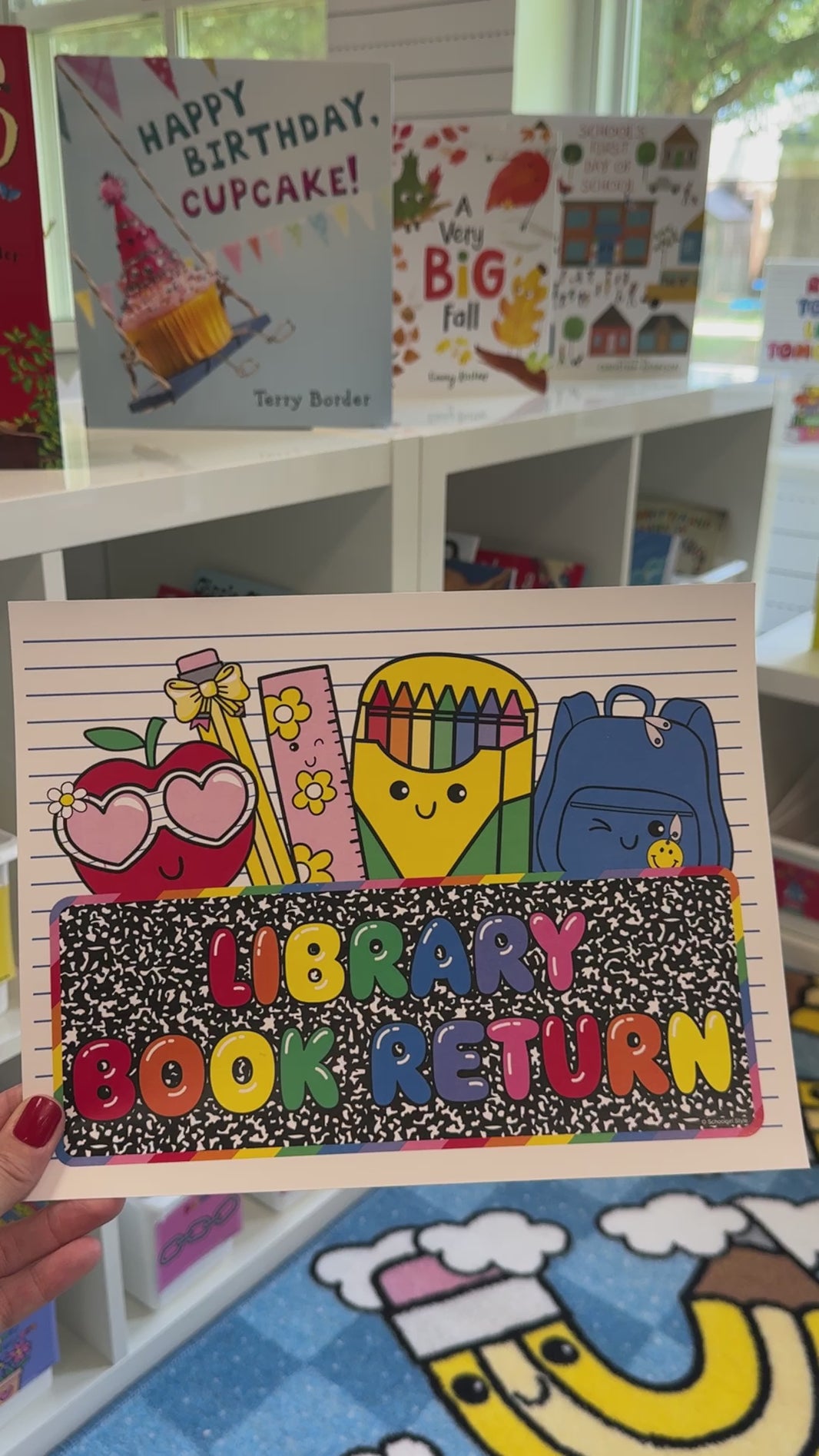 rainbow library book return sign 