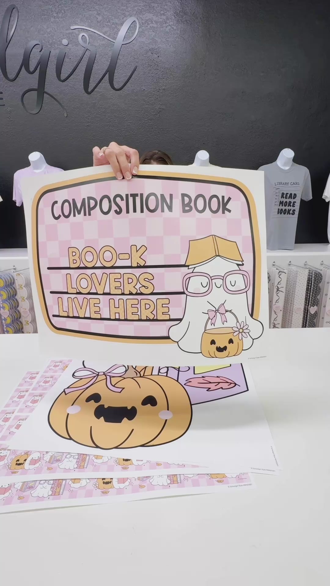 Composition notebook label with a ghost and a book that says boo-k lovers live here. 