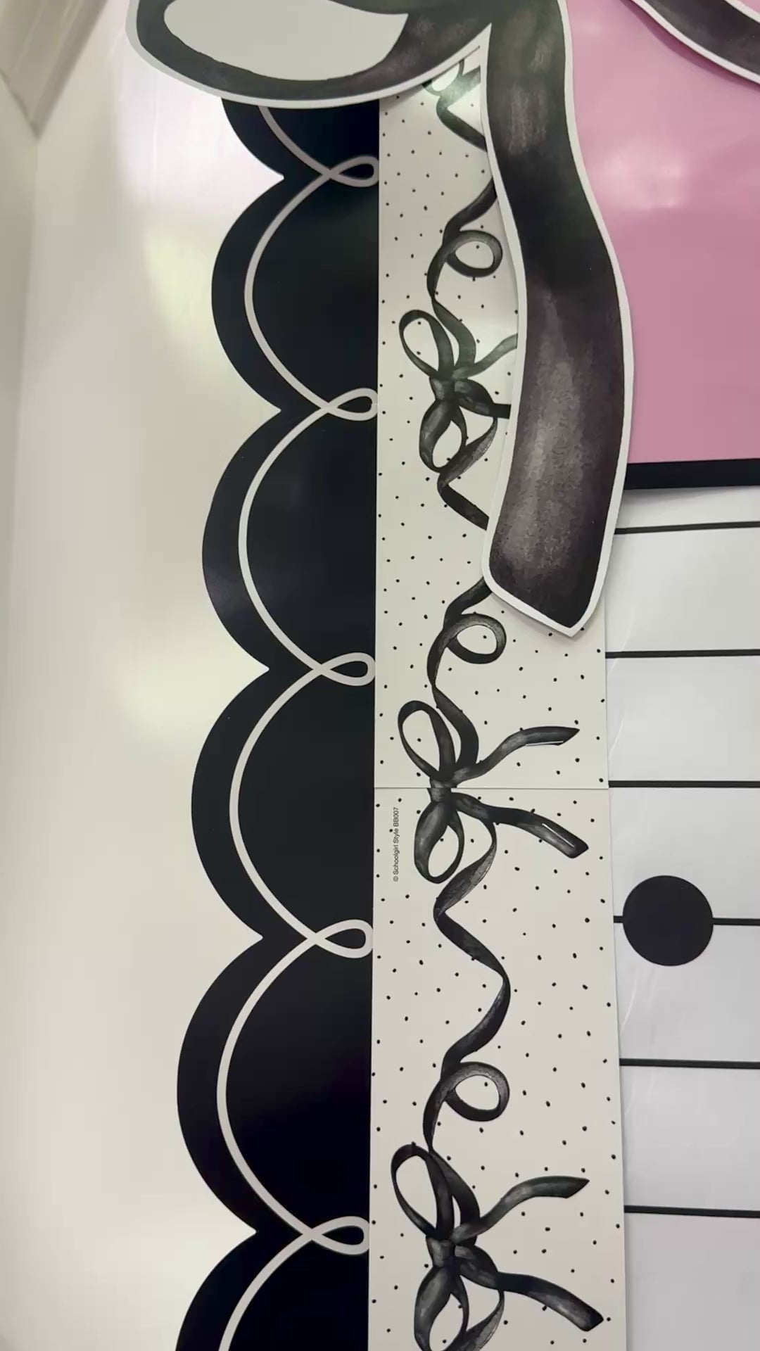 Black with white outline border