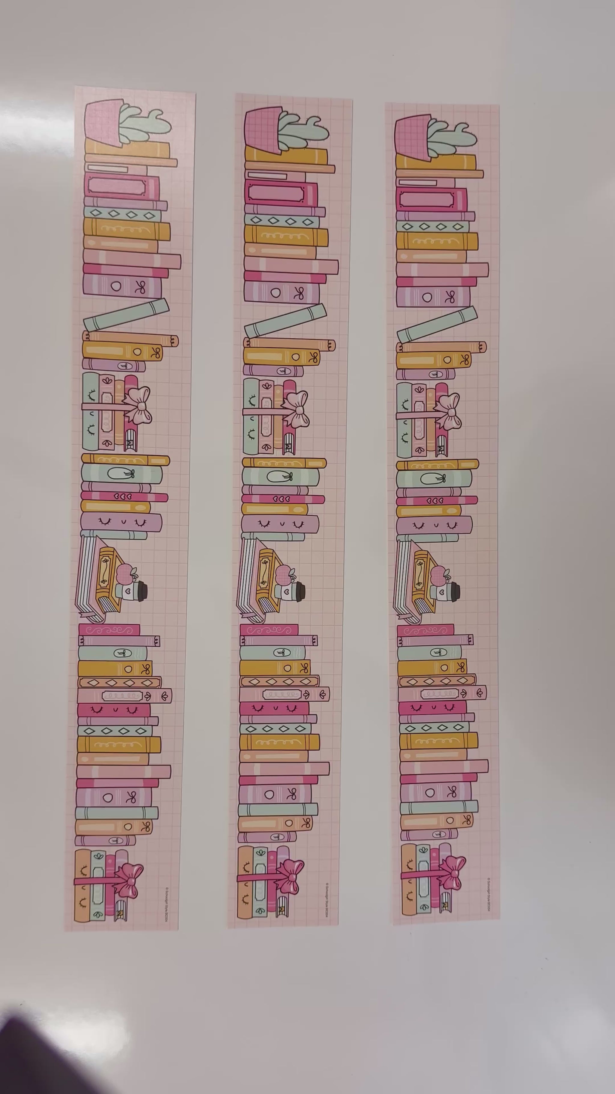 Bookworm pastel book stack border 
