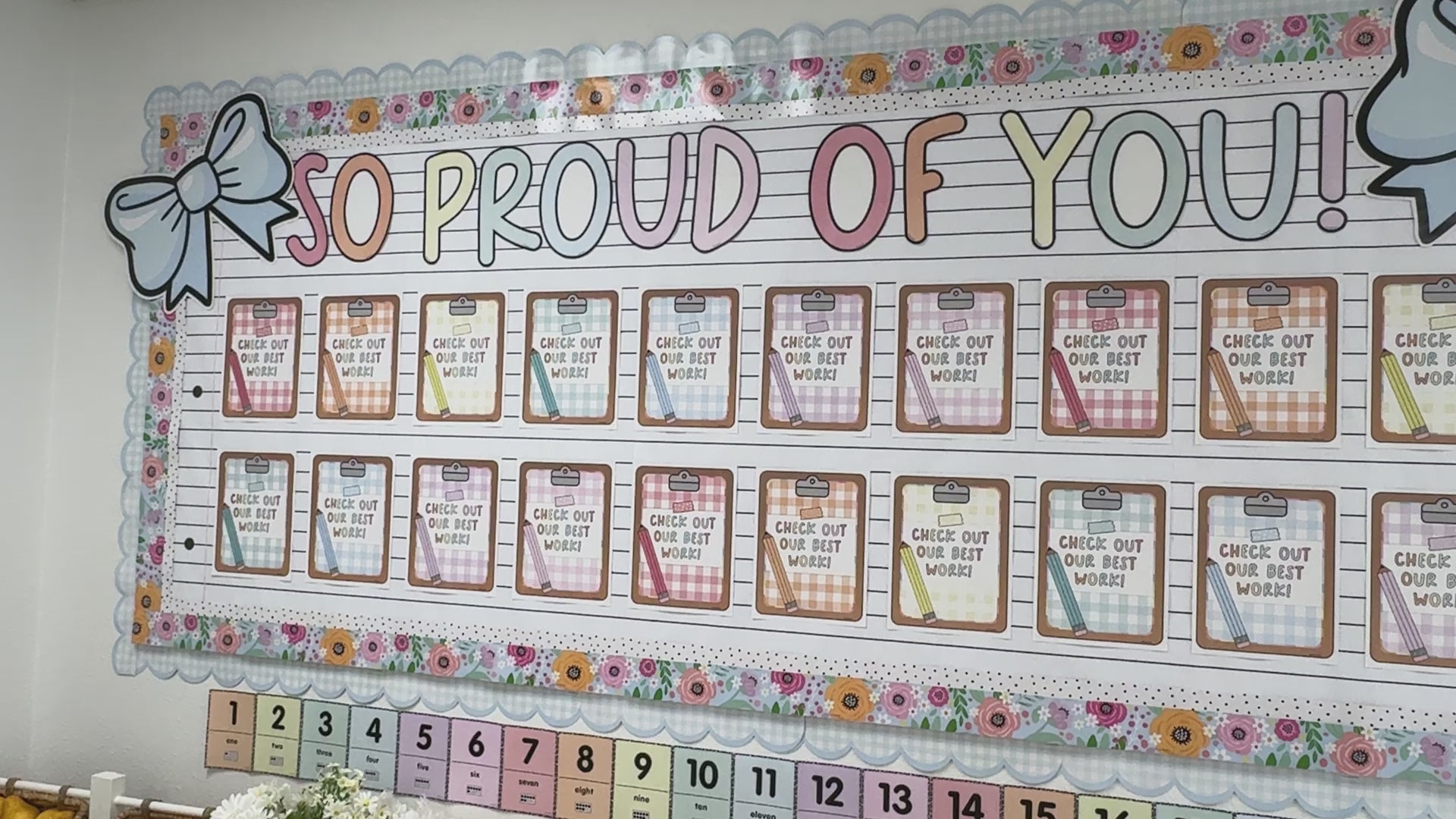 So proud of you display with student work and bows 