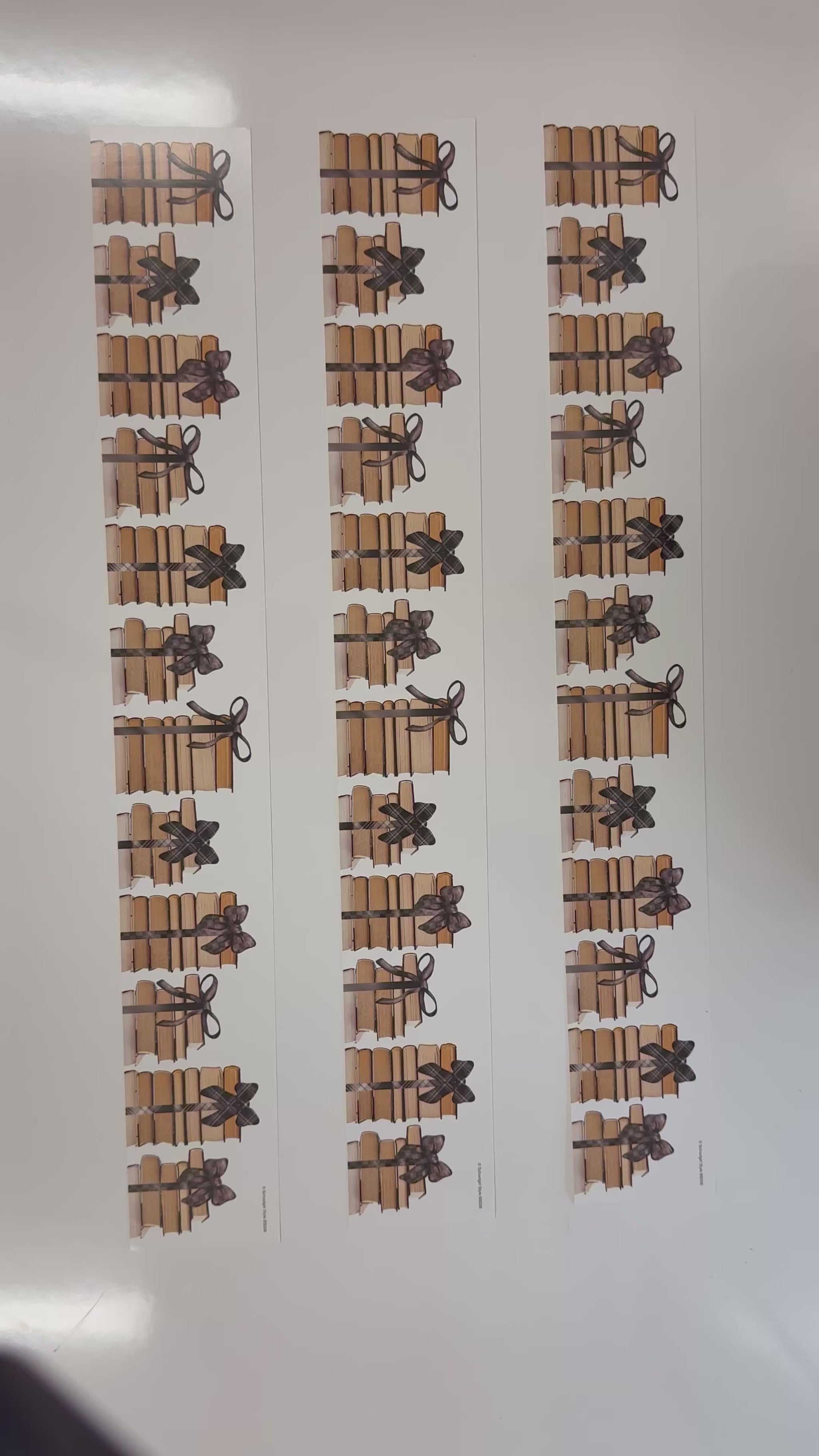 Vintage book stack with black bows border 