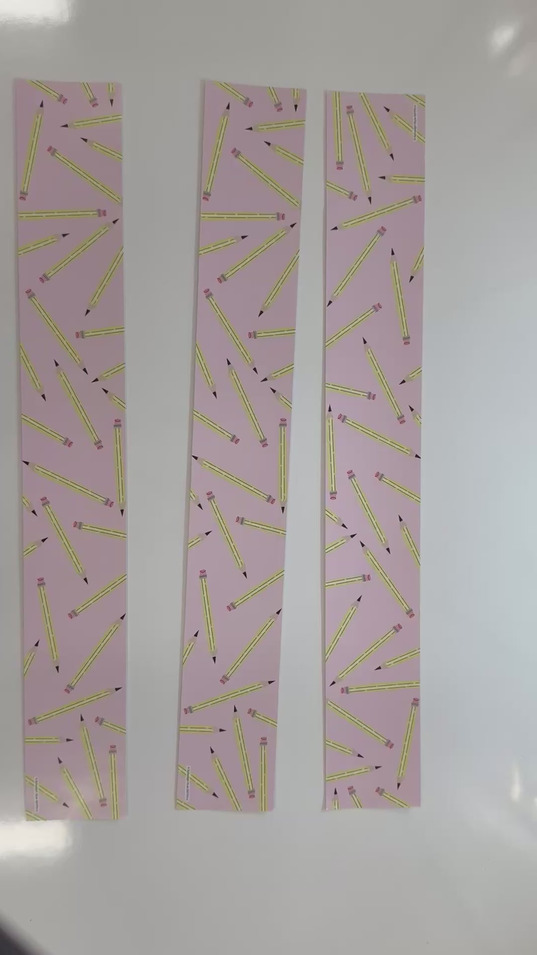 Pastel pink with yellow pencils border 