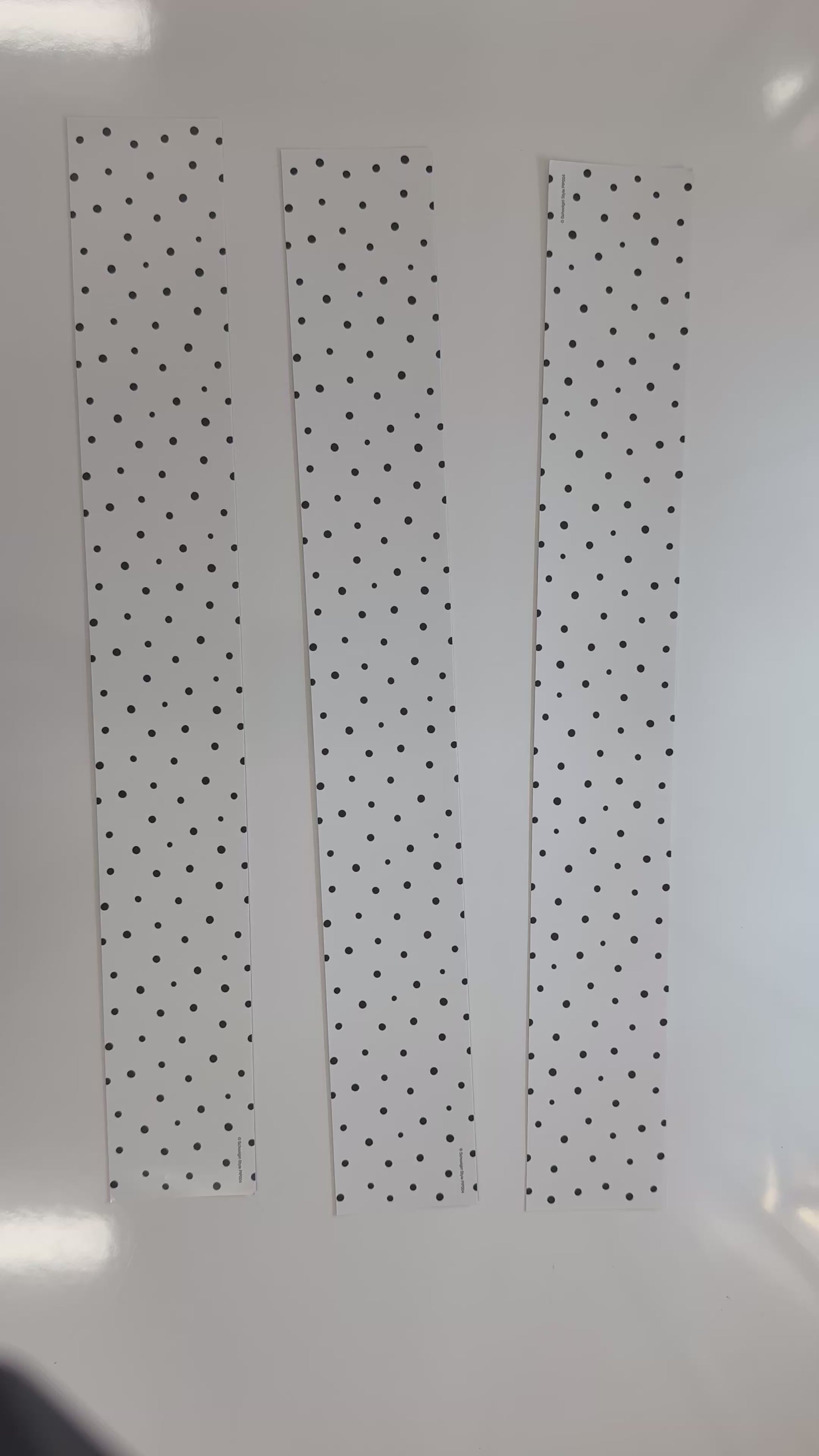 white and black polka dots border 
