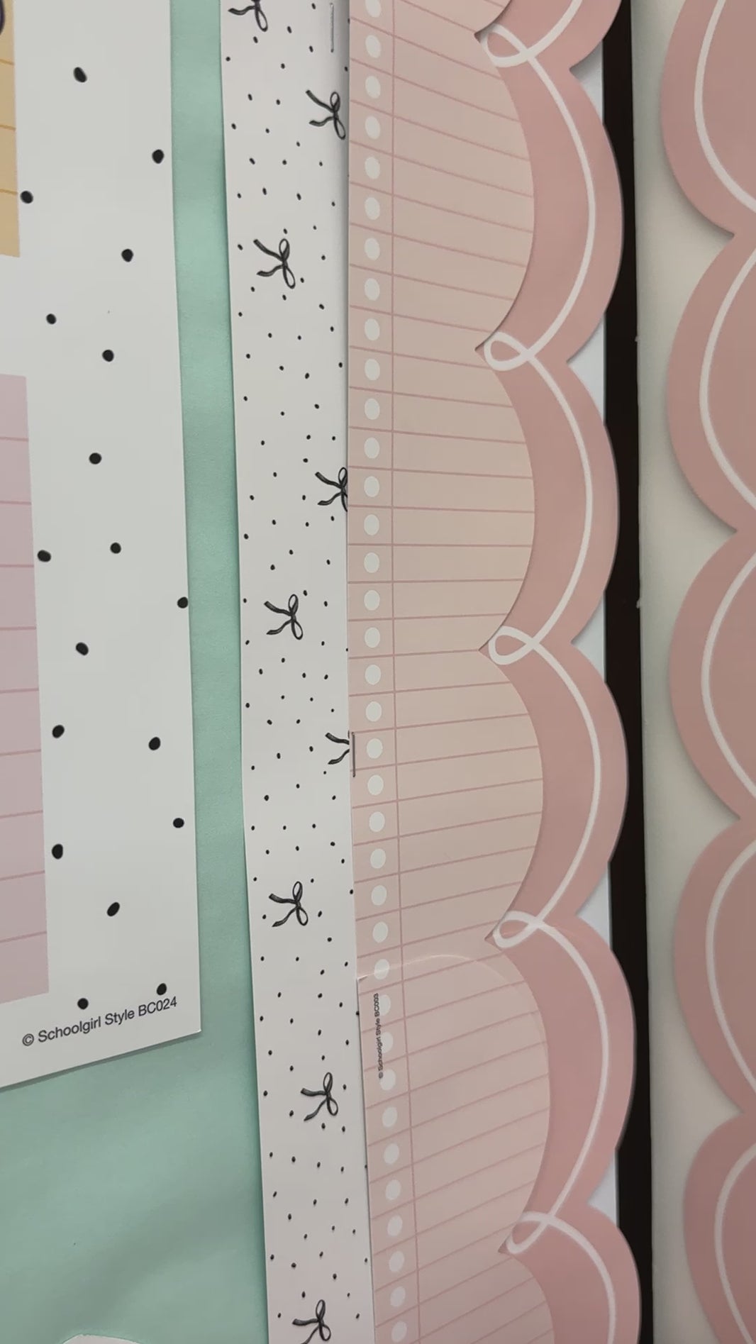 Black and white bow and polka dot, pastel pink notebook paper, and coral pink and white loop border 