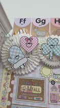 Load and play video in Gallery viewer, a year in pastel seasonal character cutouts
